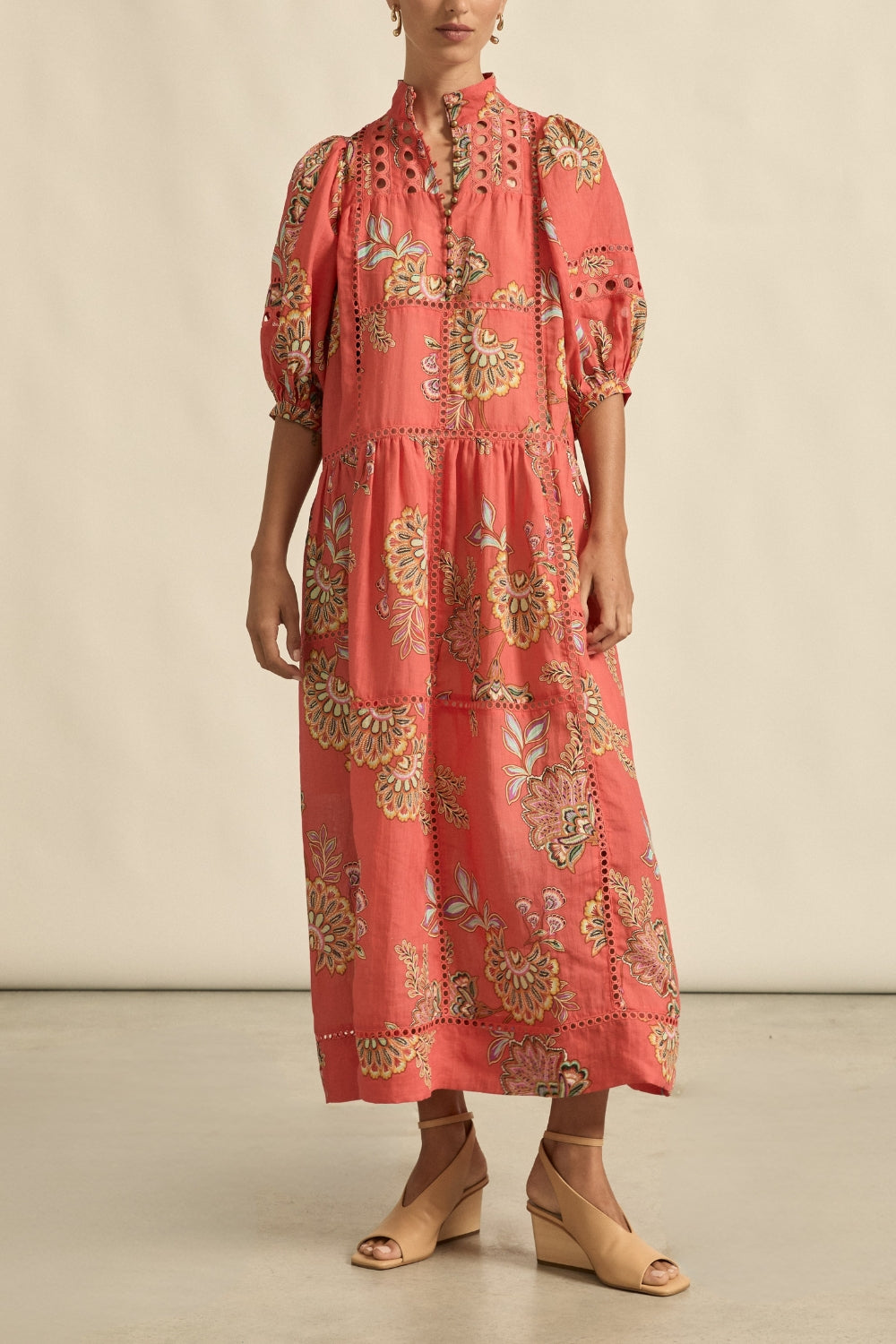 maxi dress in melon with oriental print worn by model 