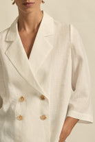 womens double breasted jacket in porcelain worn by model close up