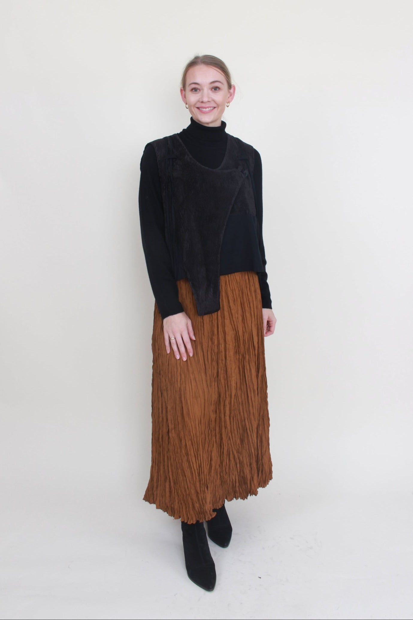 bone and arrow zen waistcoat worn with alquema gold skirt