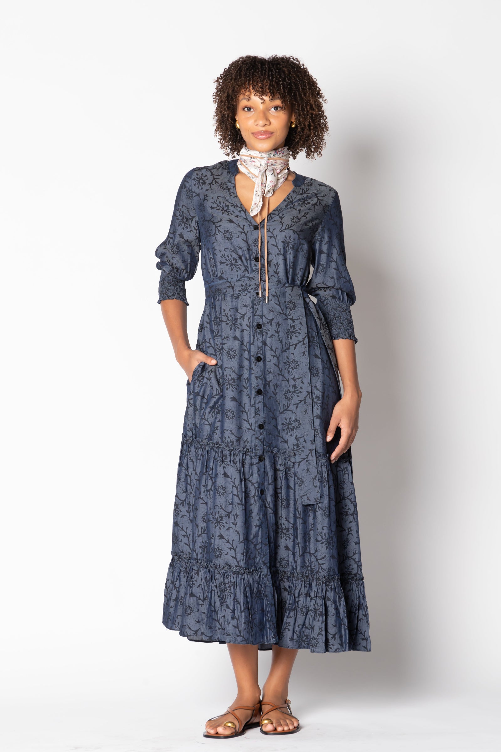 Model wearing Ruby Yaya Vaqueros Maxi Dress in navy denim – V-neck, button front, tiered skirt, 3/4 sleeves, and self belt